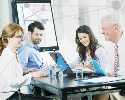 Business people sitting at meeting and  working on laptop. Teamwork at office.
